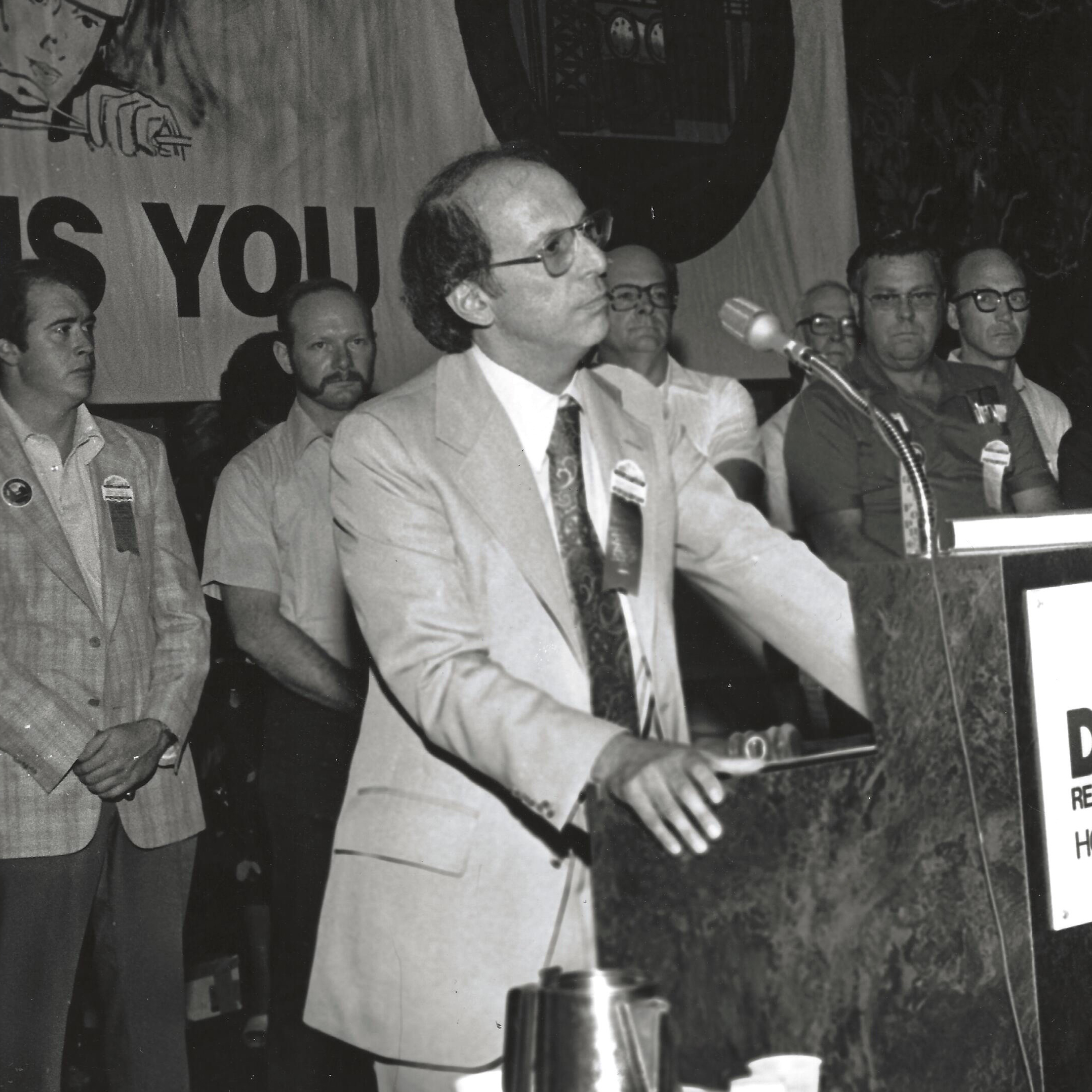 Photo of Tony Mazzocchi at a podium
