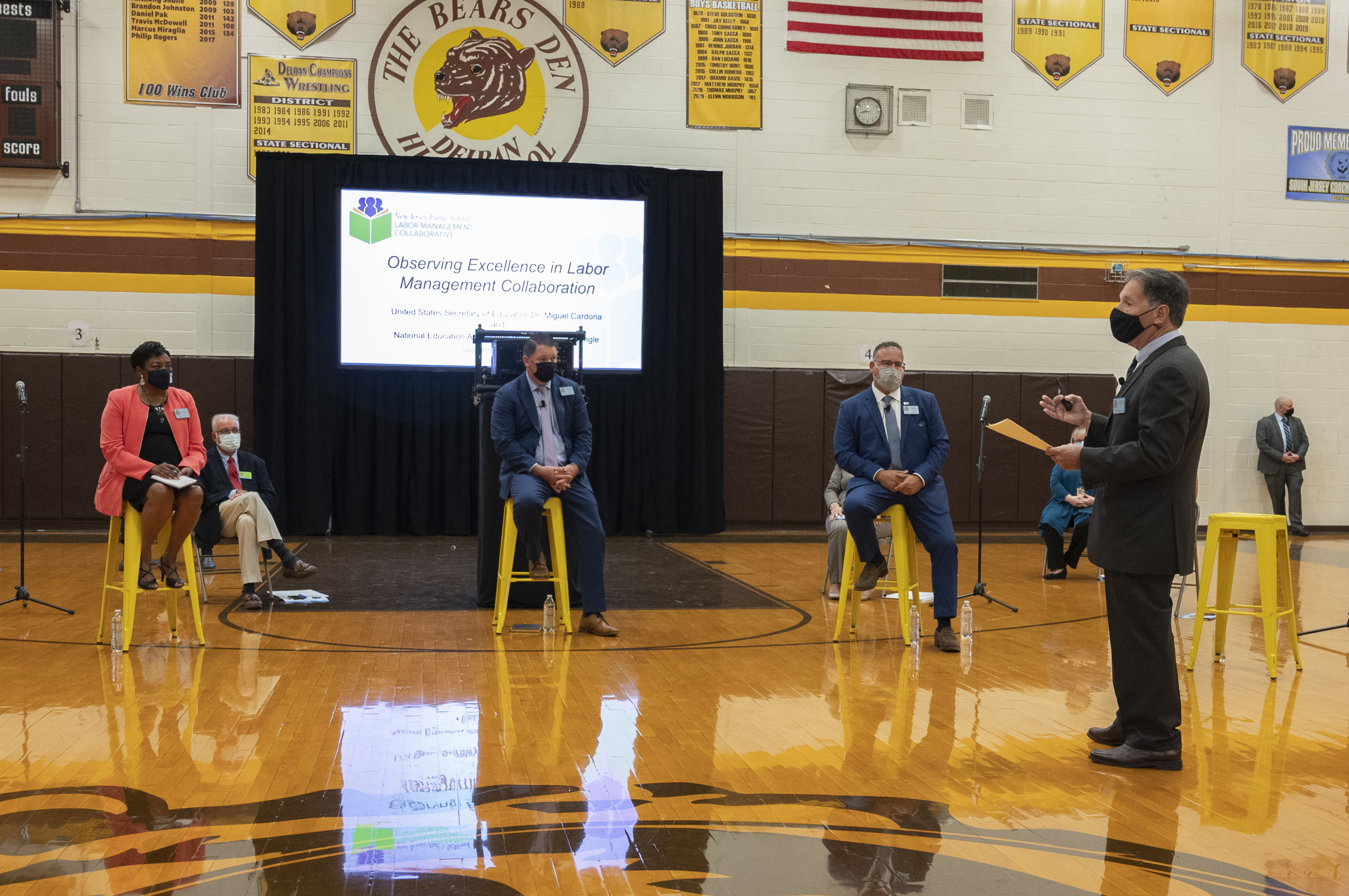 photo of Saul Rubinstein presenting research at Delran High School