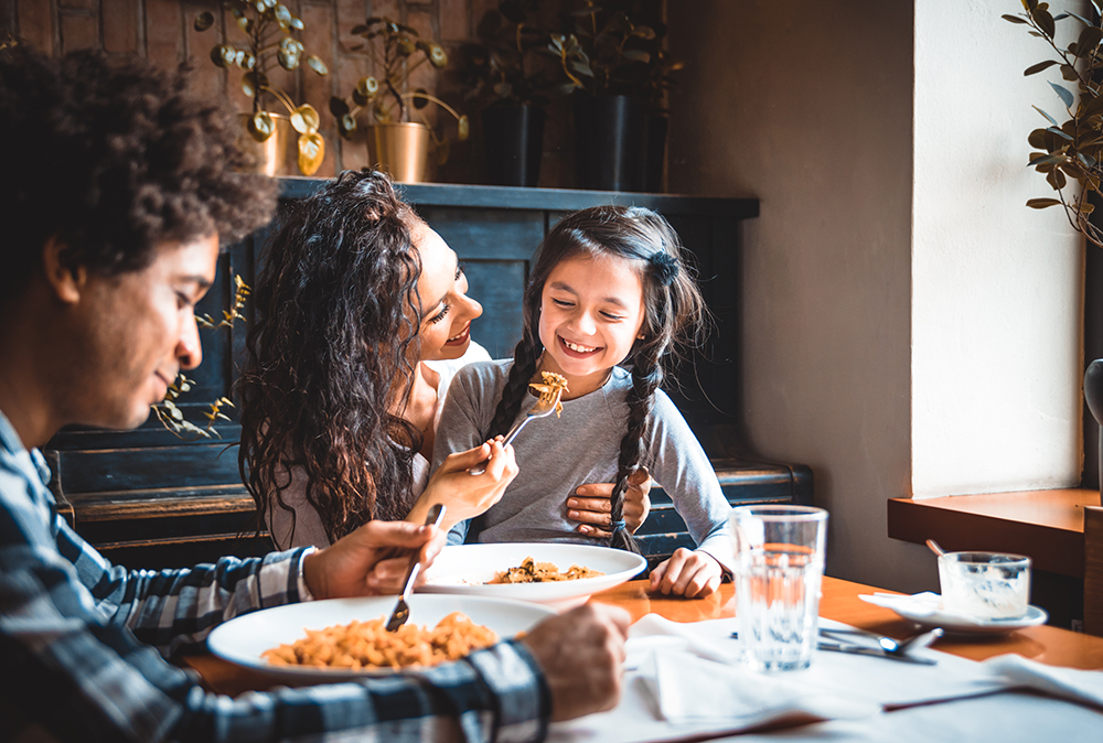 image of family eating lunch