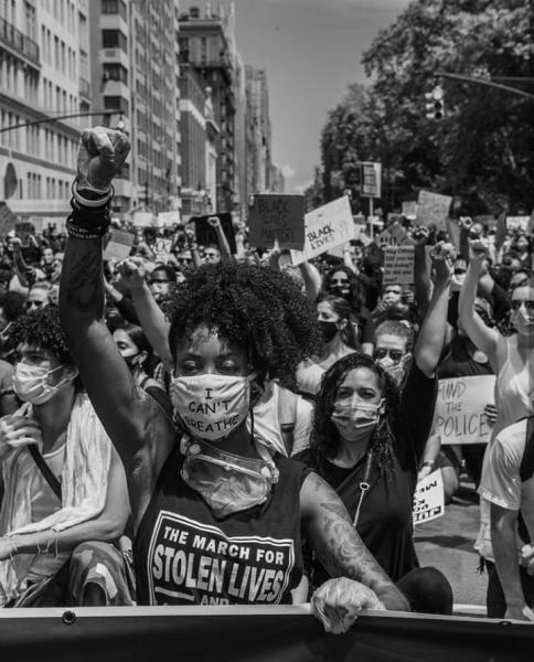 photo of Tami Lee leading protest