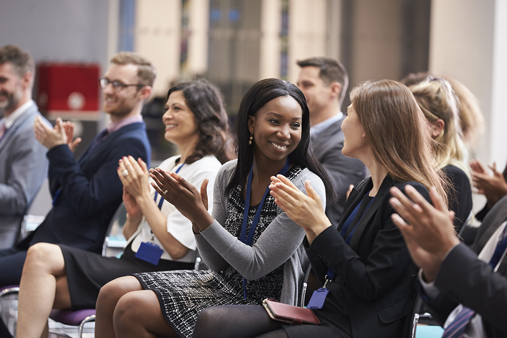 Photo of people attending a conference