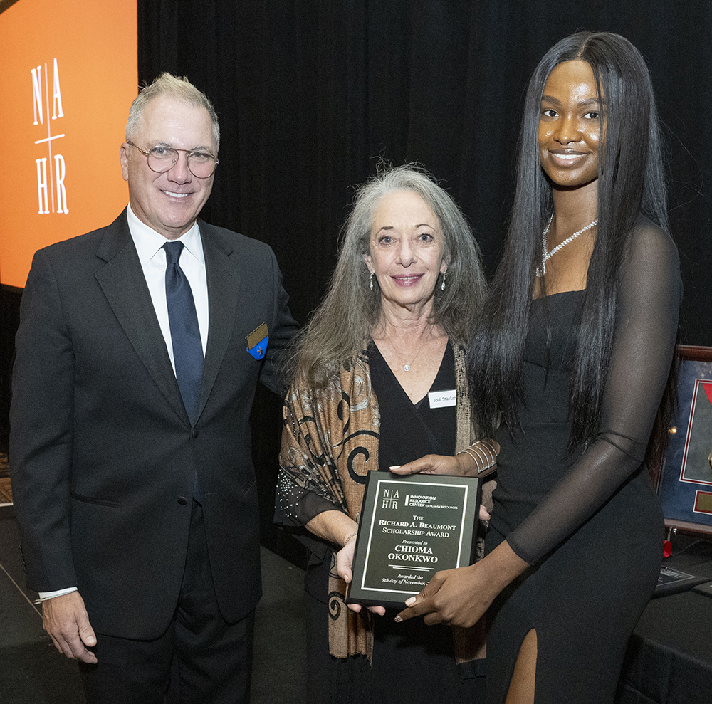 Photo of Chioma Okonkwo receiving NAHR award