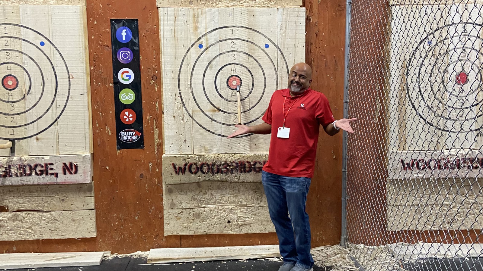 SMLR Alumna standing next to bulls-eye