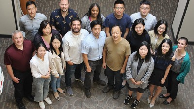 photo of Ph.D. program students and program director