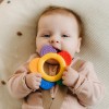 Image of child with teething ring